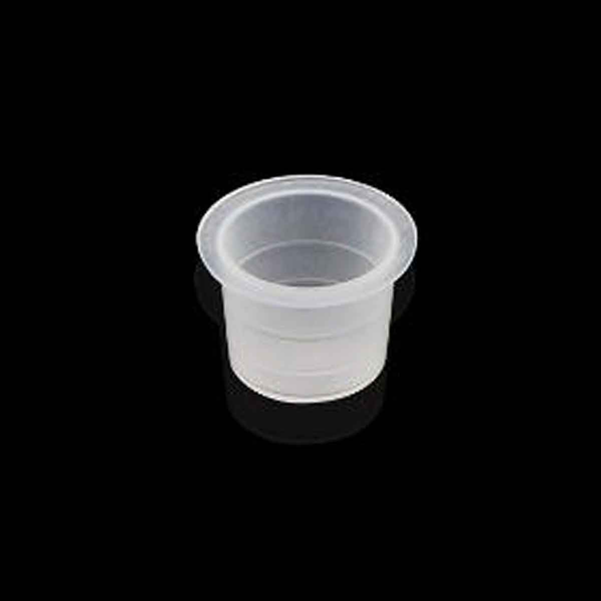 Clear plastic cup on a black background