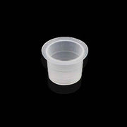 Clear plastic cup on a black background